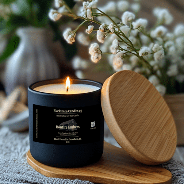 bonfire scented candle in matte black glass jar