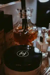 bourbon scented gift set with whiskey glass and black candle tin